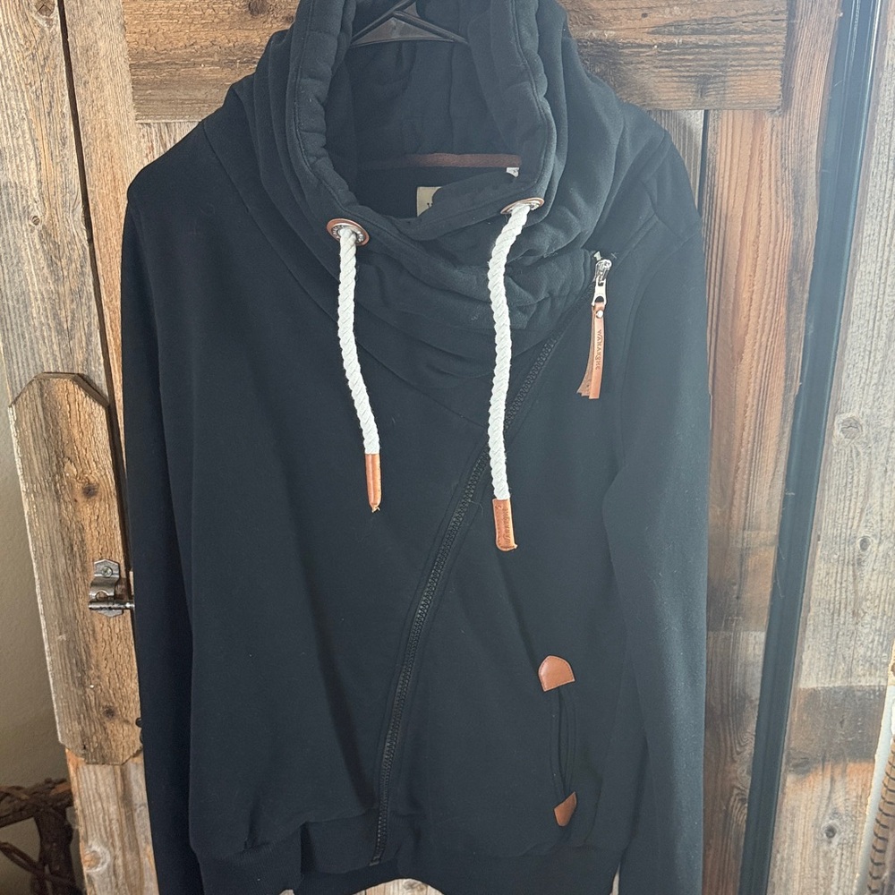 Wanakome Black Pullover with Tan Leather Patch